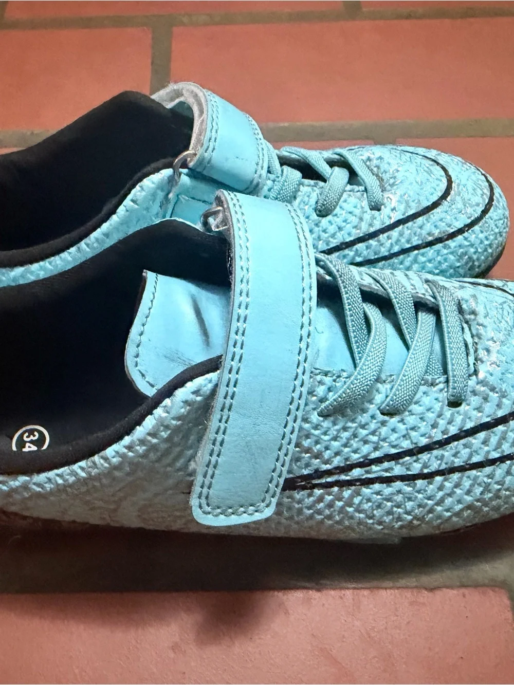 Kids Light Blue indoor soccer cleats with Hook-and-Loop Strap.
